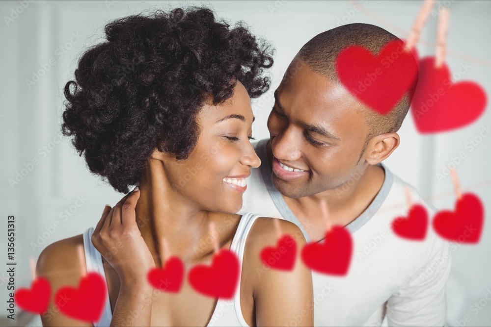 Composite image of romantic couple embracing each other