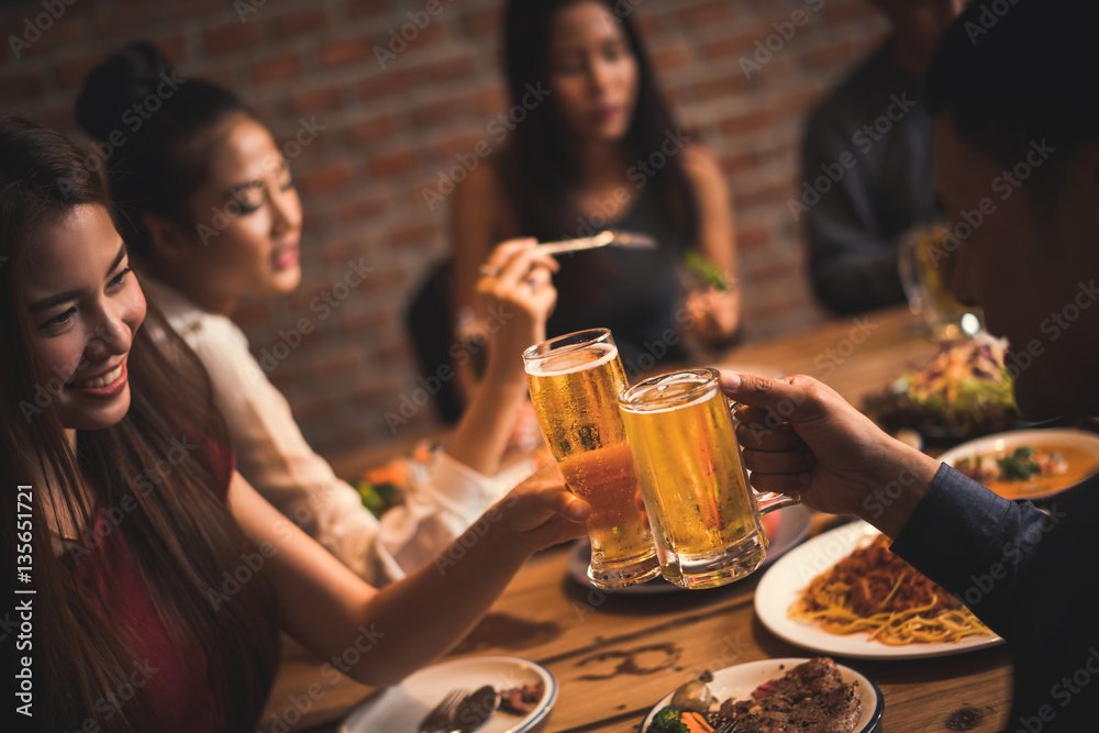 People in asian are celebrating the festival they clink glasses