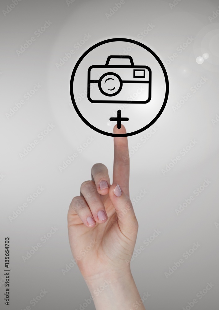 Hand touching photo camera icon