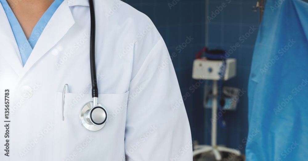 Doctor standing in operation room with stethoscope