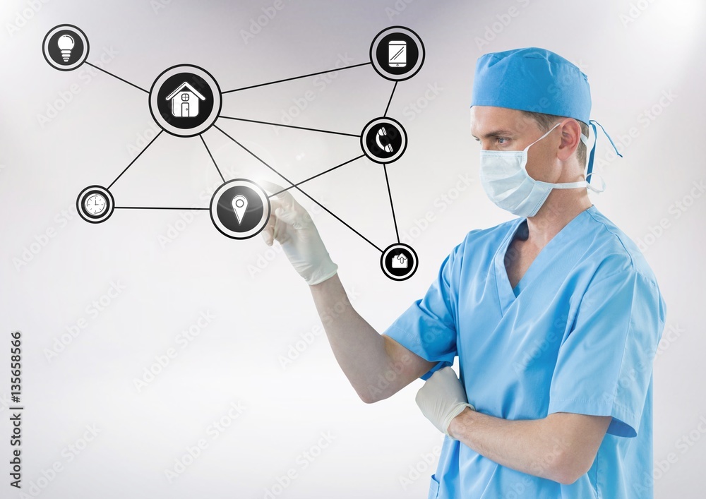 Doctor touching digitally generated connecting icons