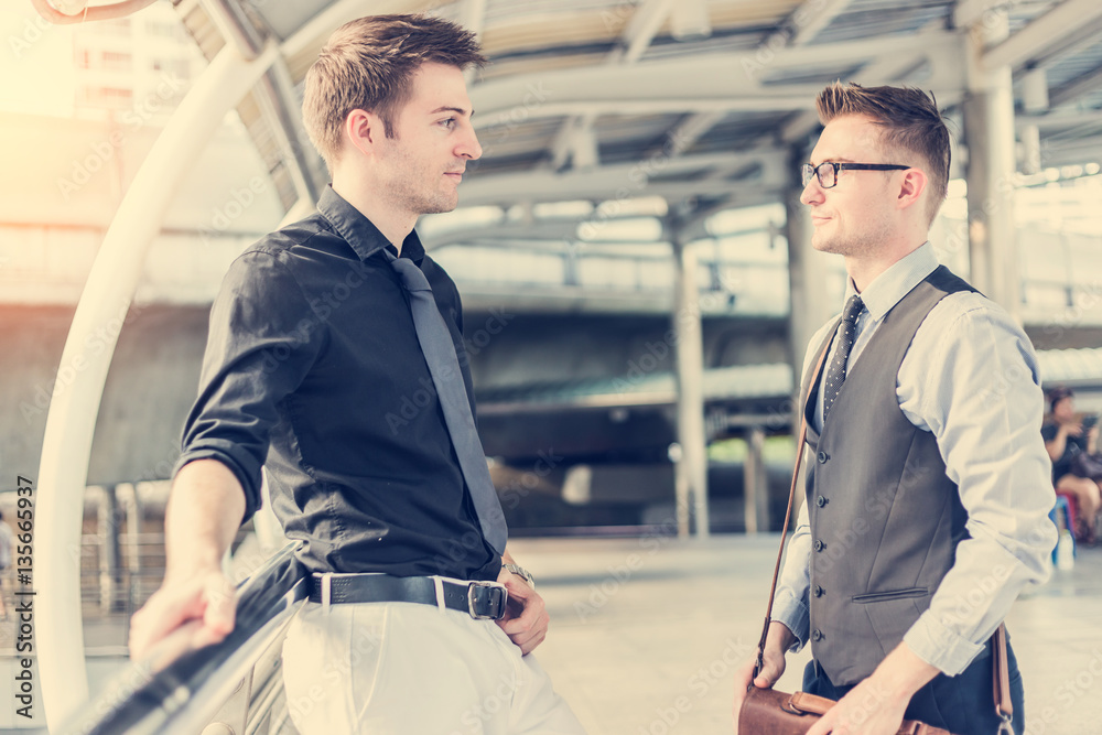 smart handsome business man meeting with his partner outdoor loc