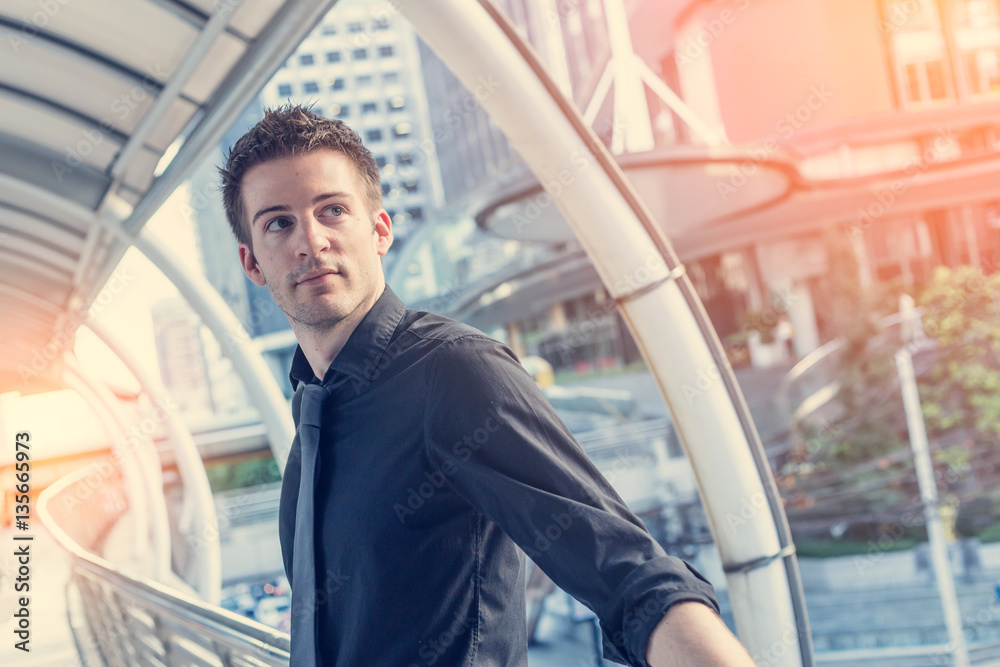 smart handsome business man outdoor with urban city background