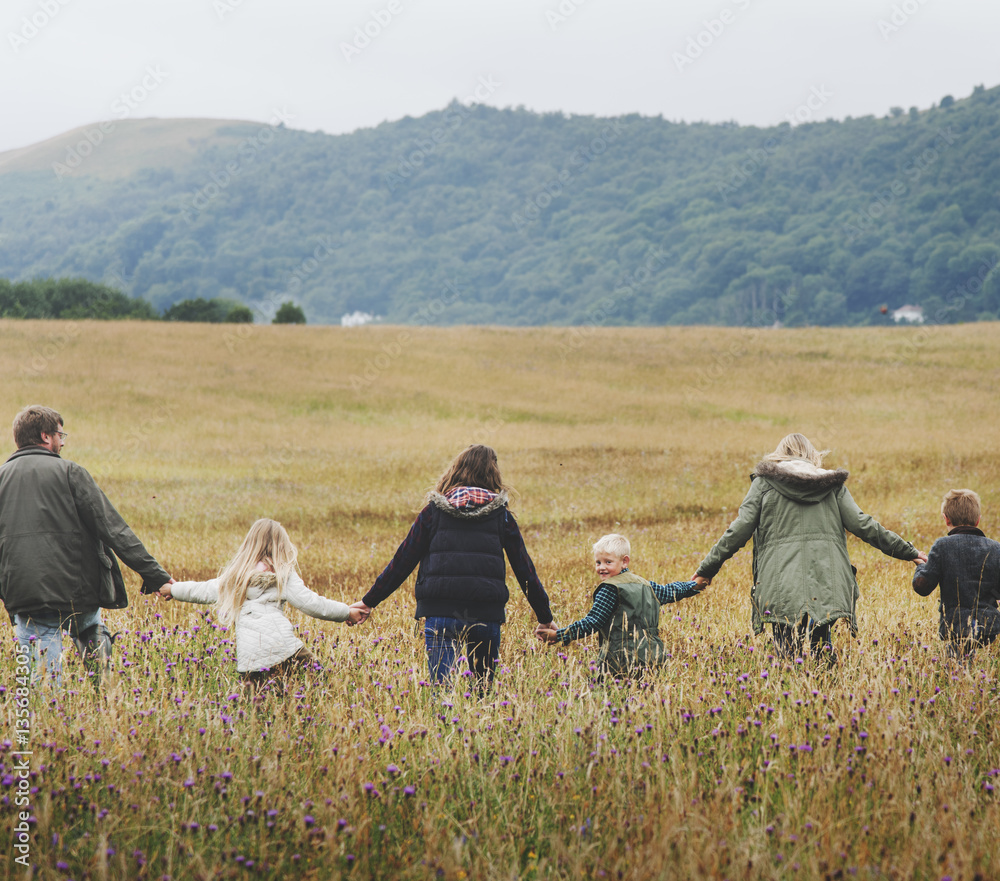 Family Walking Field Nature Togetherness Concept