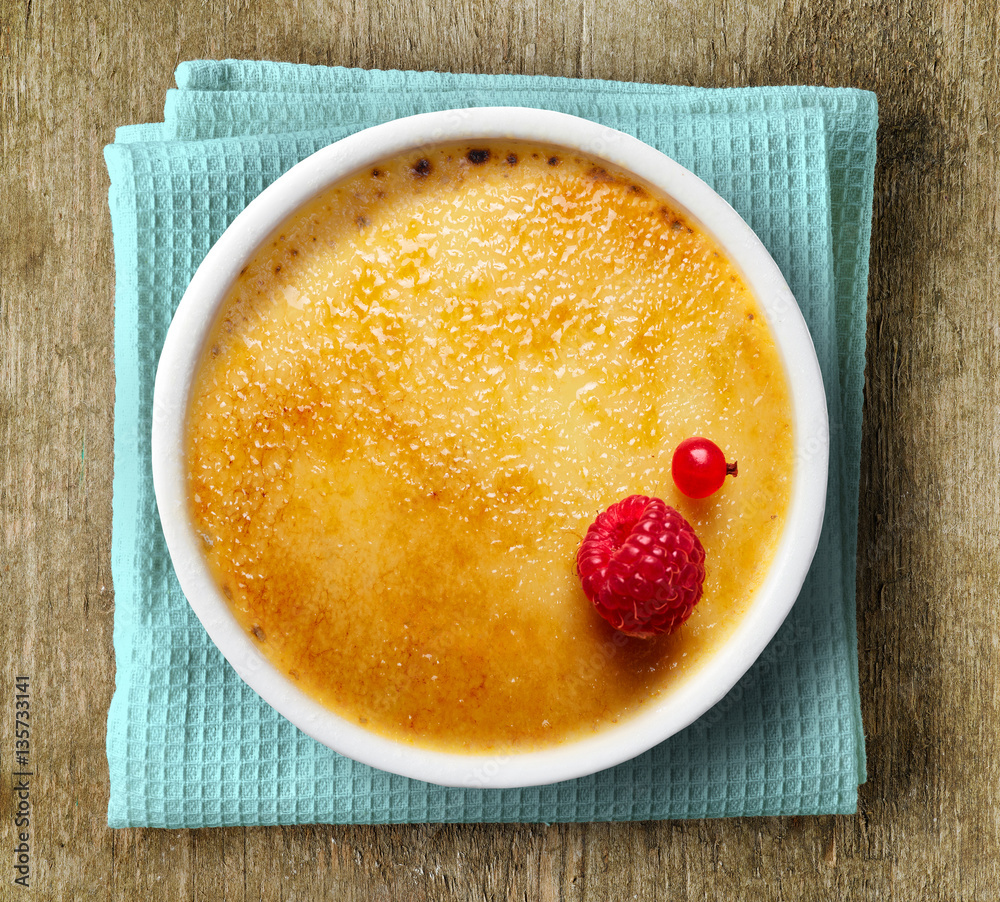 creme brule on wooden background