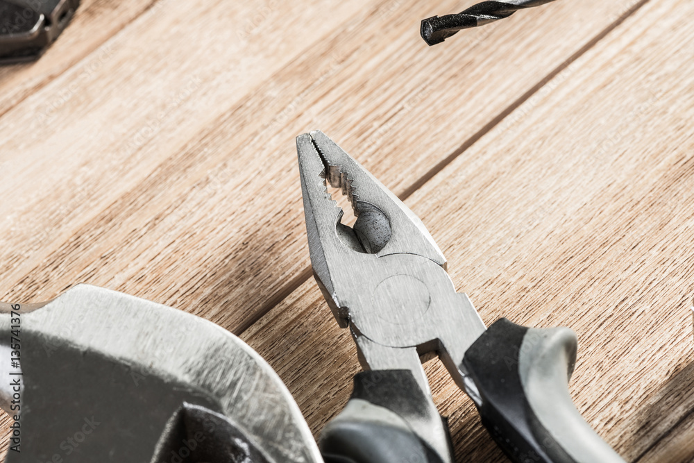 Carpentry tools on wooden surface