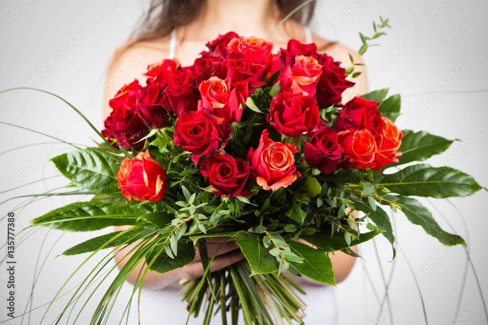 Woman Holding Bouquet Of Roses