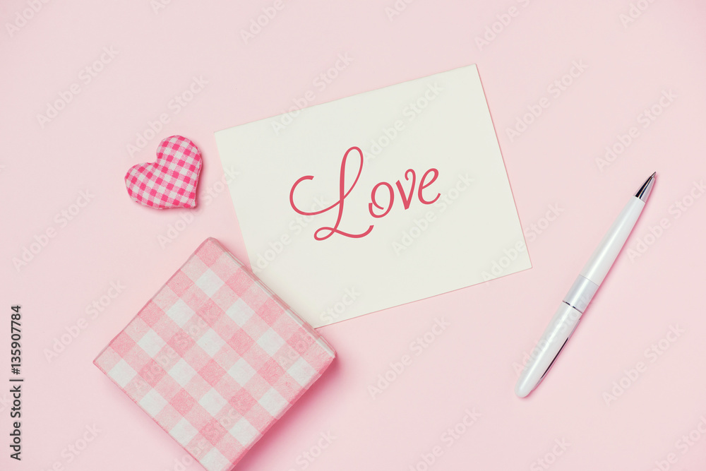 Valentines Day gift box and greeting card isolated on color back