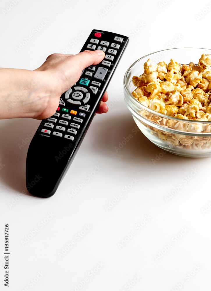 concept of watching movies with popcorn white background