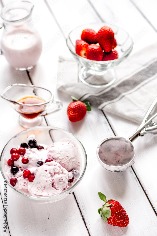 organic homemade ice cream in glass bowl on wooden background