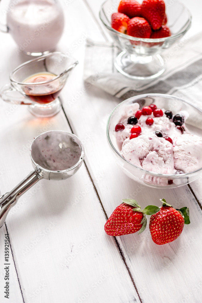 organic homemade ice cream in glass bowl on wooden background