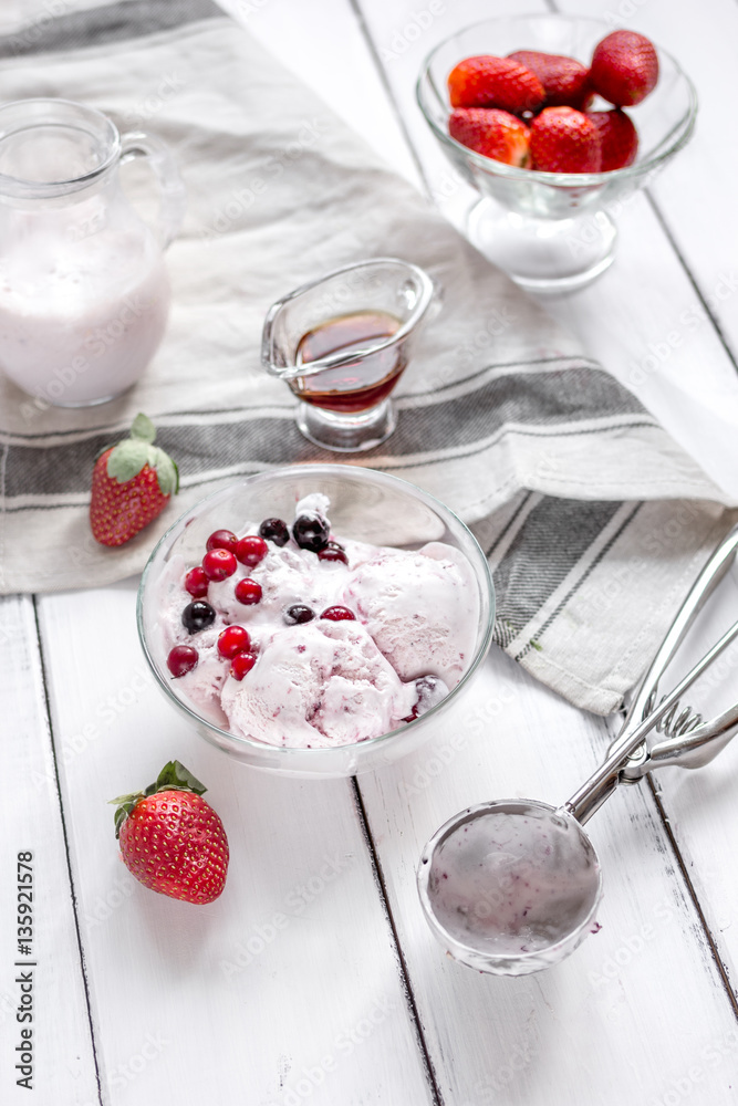 organic homemade ice cream in glass bowl on wooden background