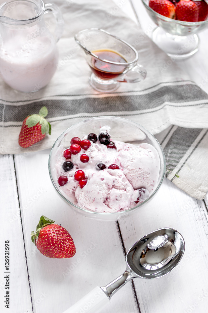 organic homemade ice cream in glass bowl on wooden background