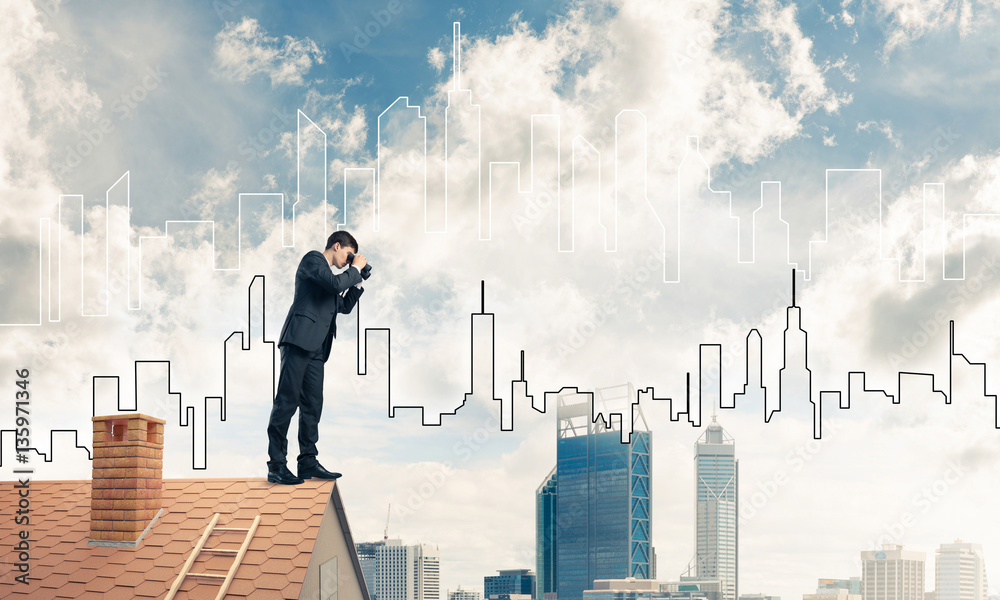 Businessman standing on roof and looking in binoculars. Mixed me