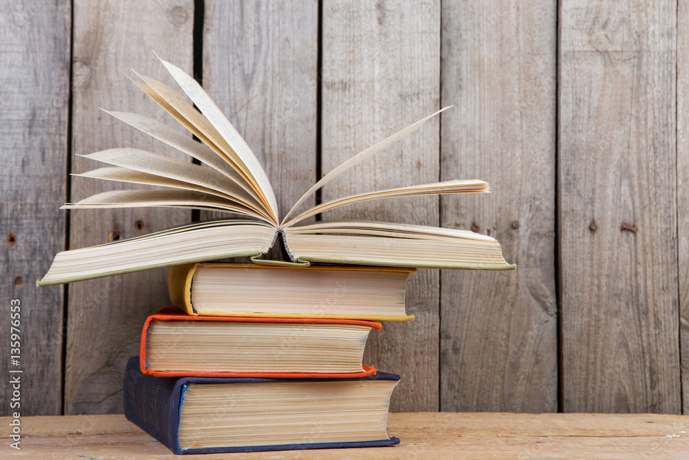 books on the wooden background