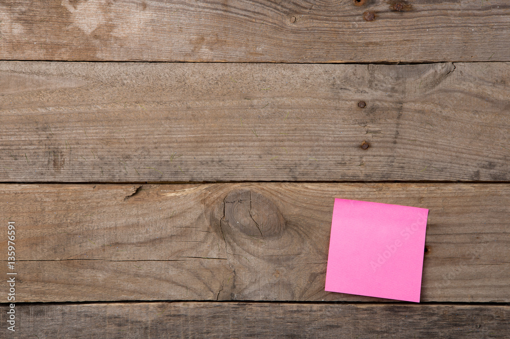 sticky note on the blank blackboard