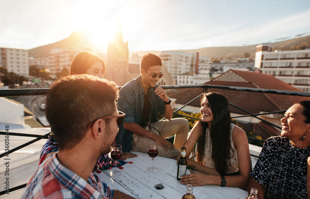 Friends having a party on the rooftop