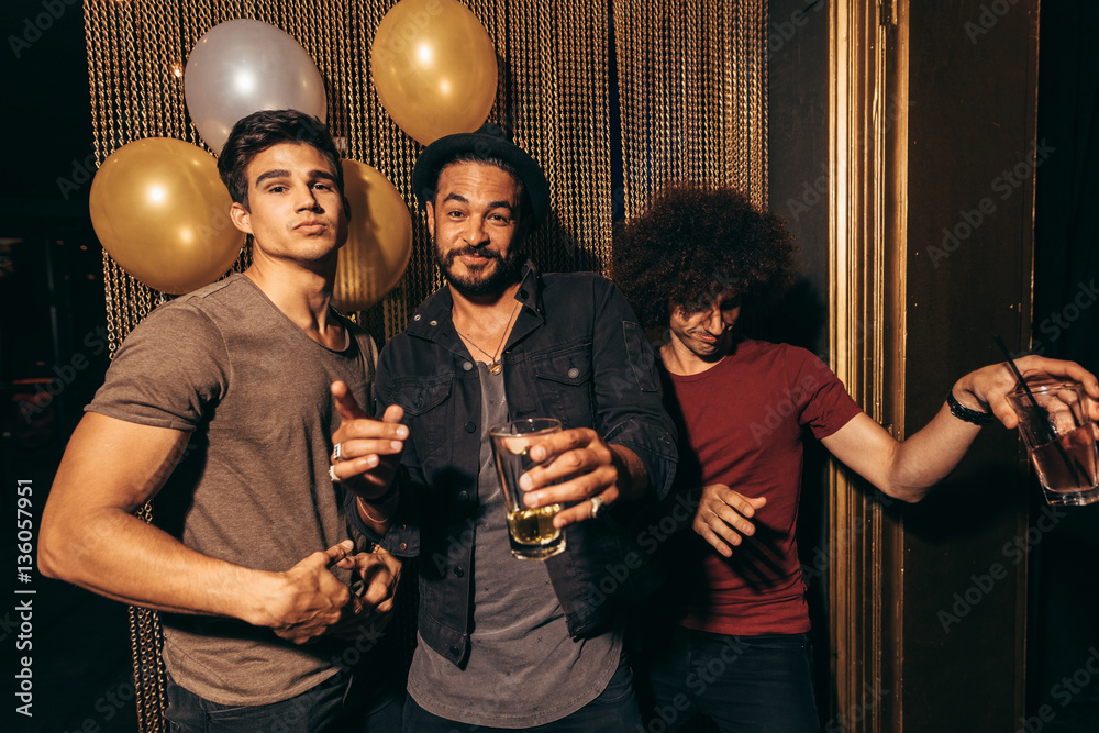 Group of men at pub with drinks