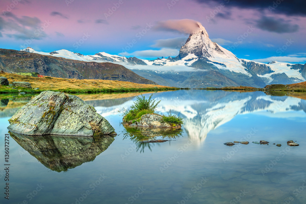 Colorful sunrise with Matterhorn peak and Stellisee lake, Valais, Switzerland