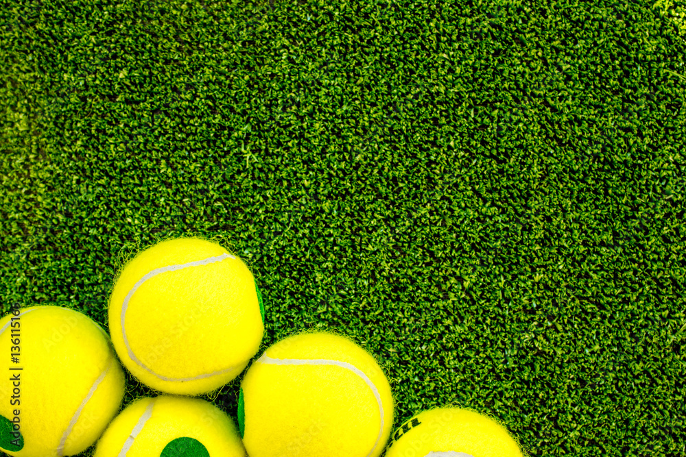 tennis ball on green background top view mock up