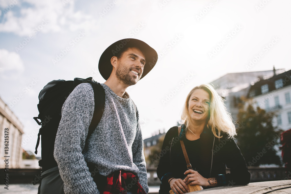 Happy young tourist couple on vacation.