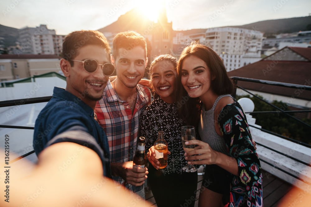 Group of friends taking selfie