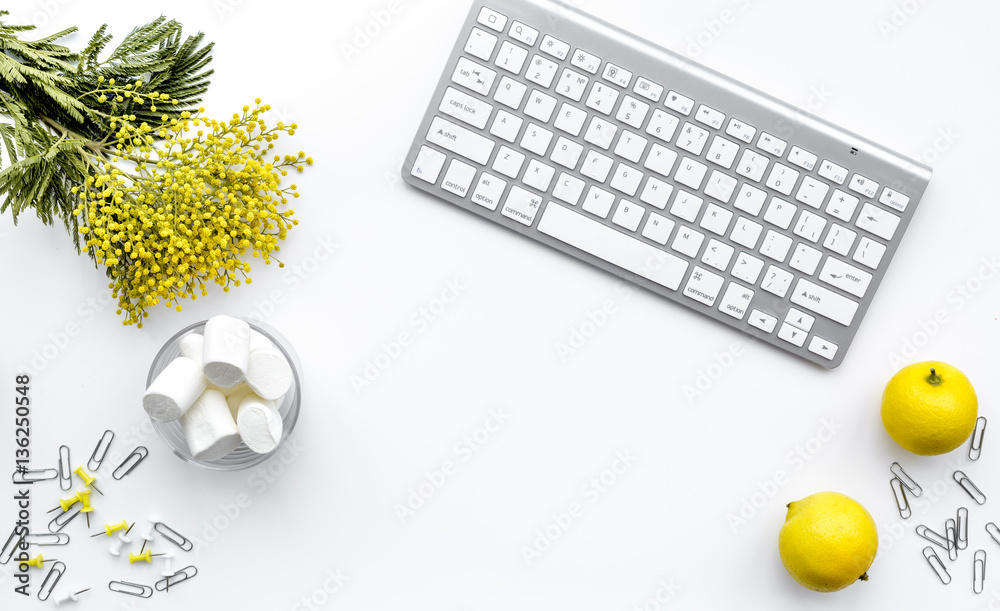 female desktop with keyboard and flowers top view mock up