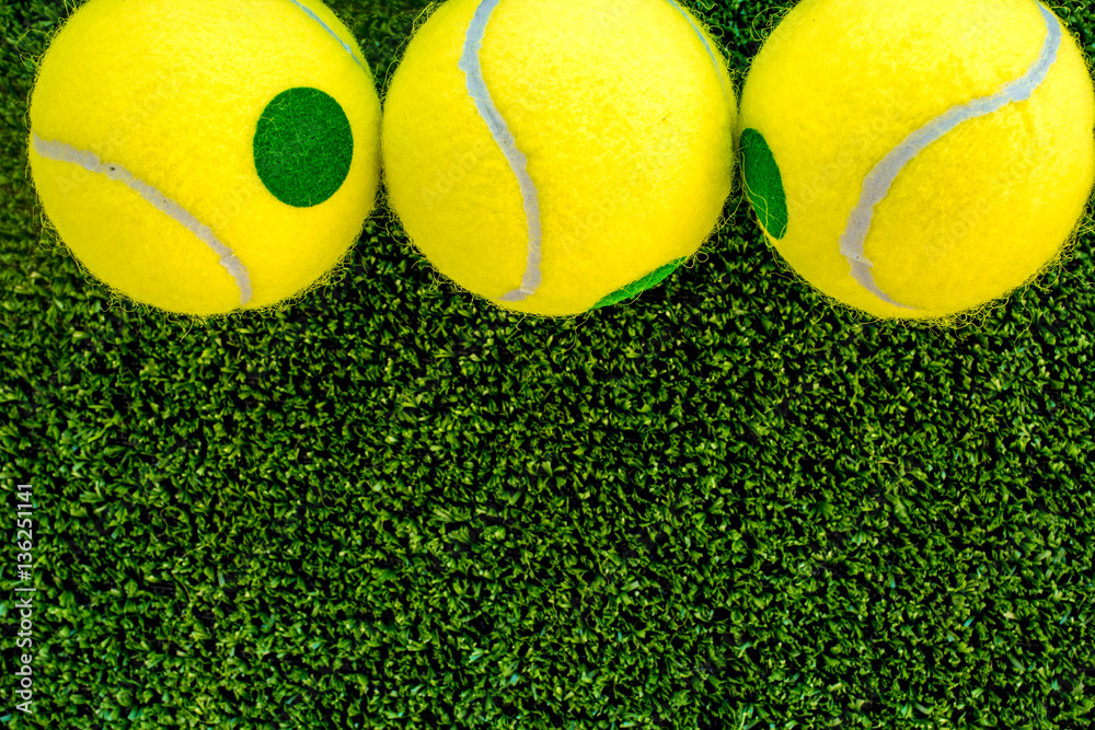 tennis ball on green background top view mock up