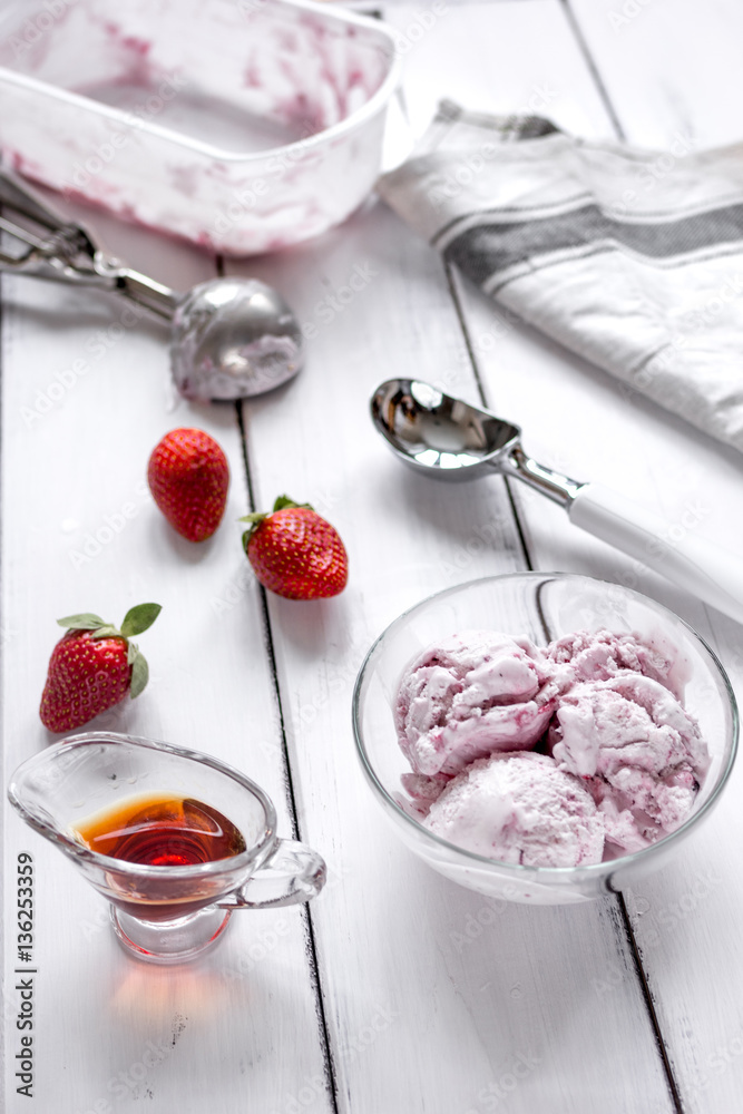 organic homemade ice cream in glass bowl on wooden background