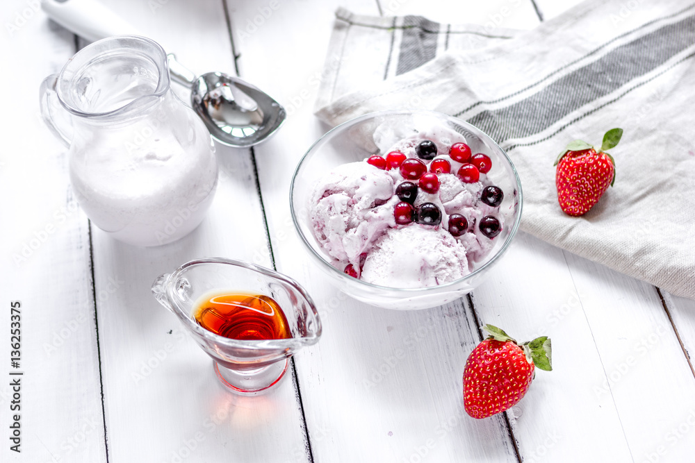 organic homemade ice cream in glass bowl on wooden background