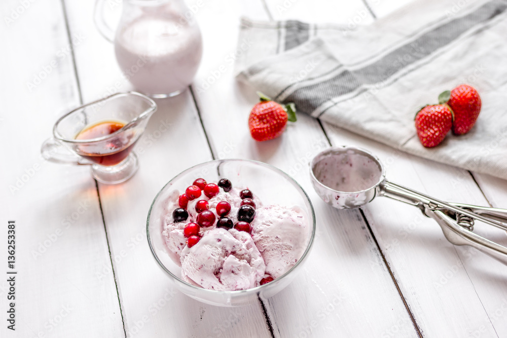 organic homemade ice cream in glass bowl on wooden background