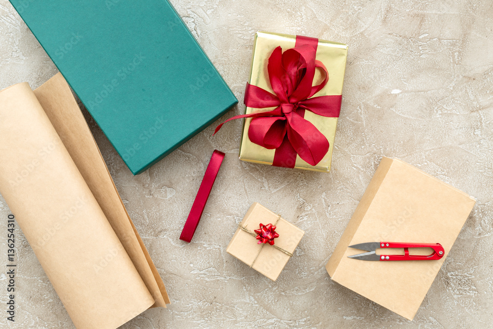 wrapping gifts in box for holiday top view mock up