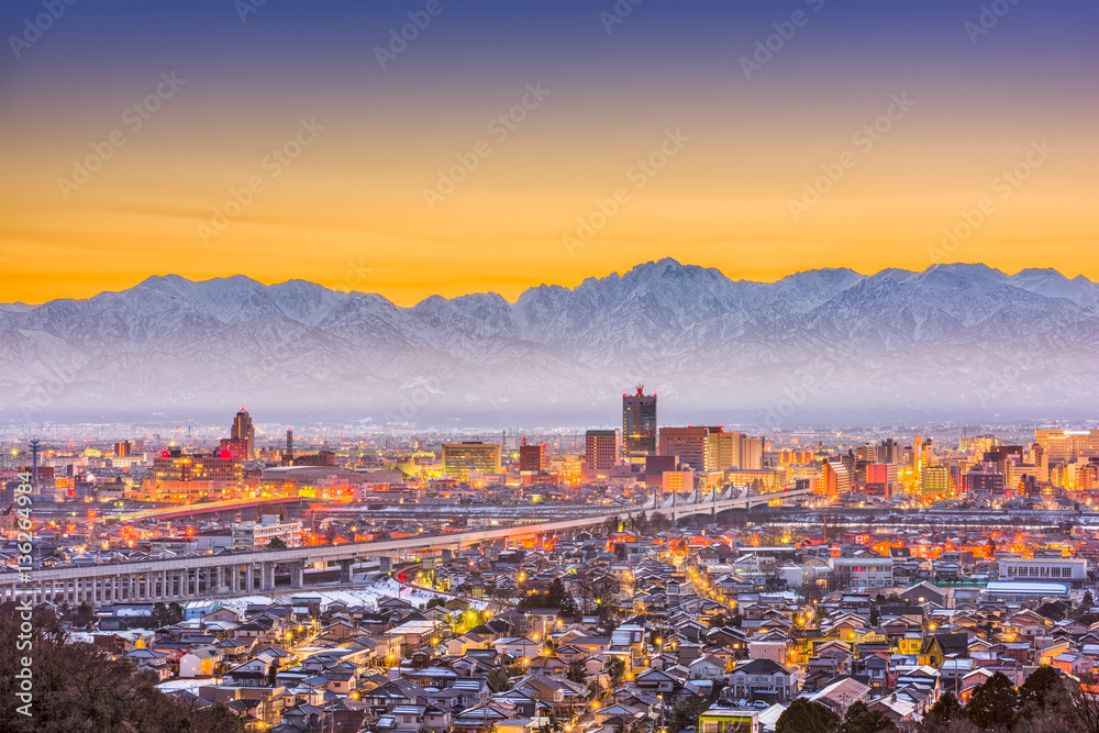 Toyama, Japan Skyline with Tateyama Mountain.