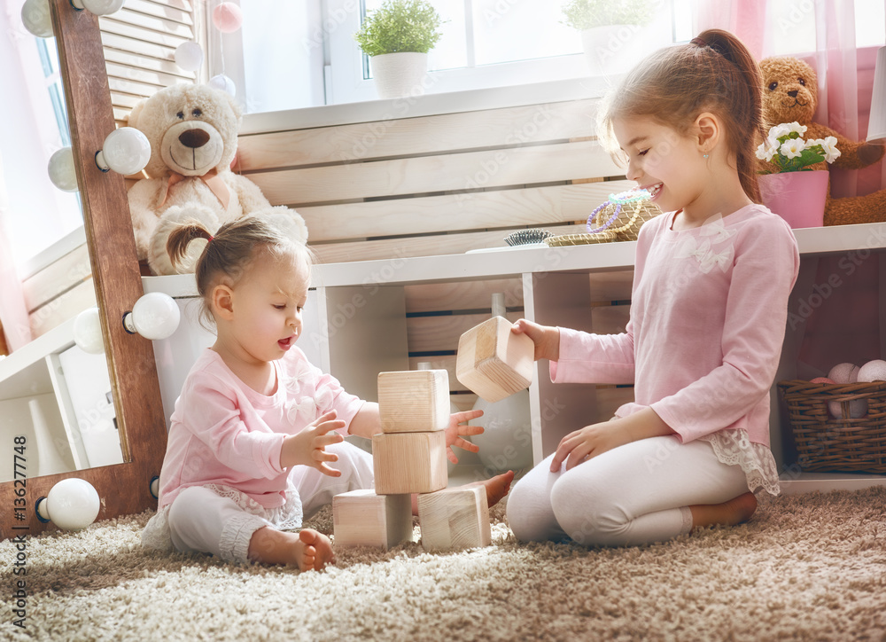 children are playing with blocks