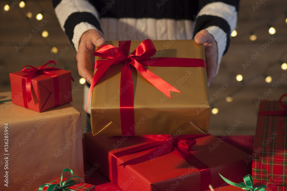 Men presents a gift box