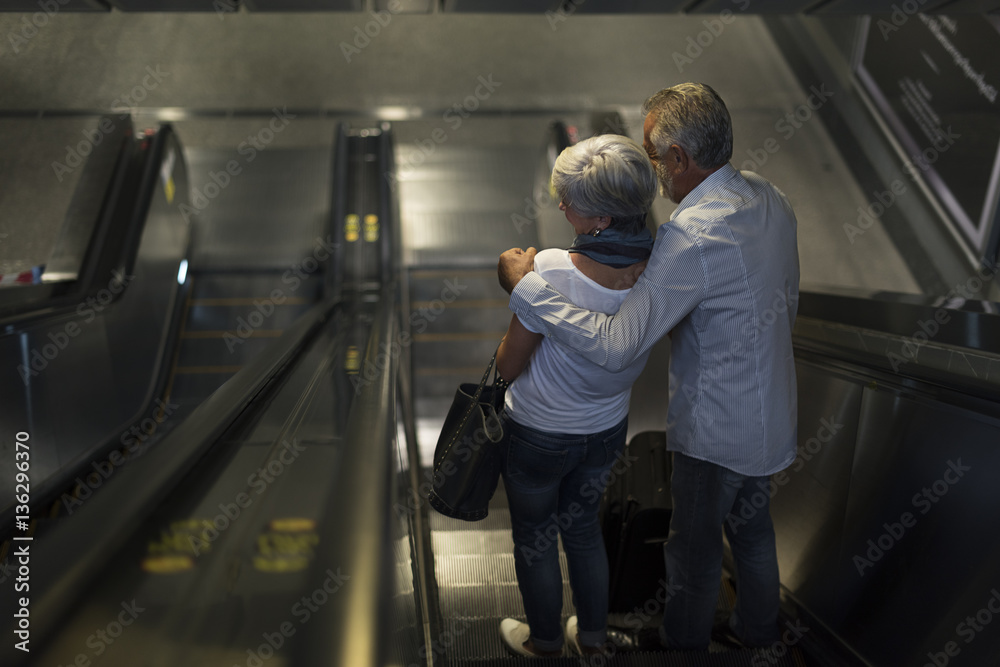 Senior couple tourists traveling city