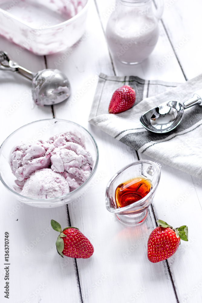 organic homemade ice cream in glass bowl on wooden background