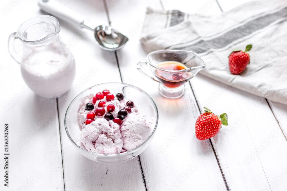 organic homemade ice cream in glass bowl on wooden background