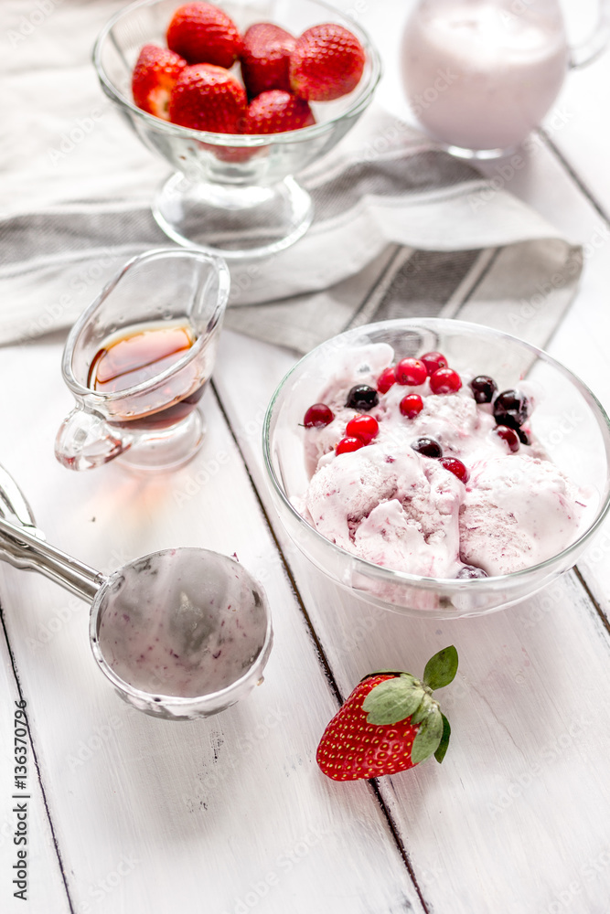 organic homemade ice cream in glass bowl on wooden background