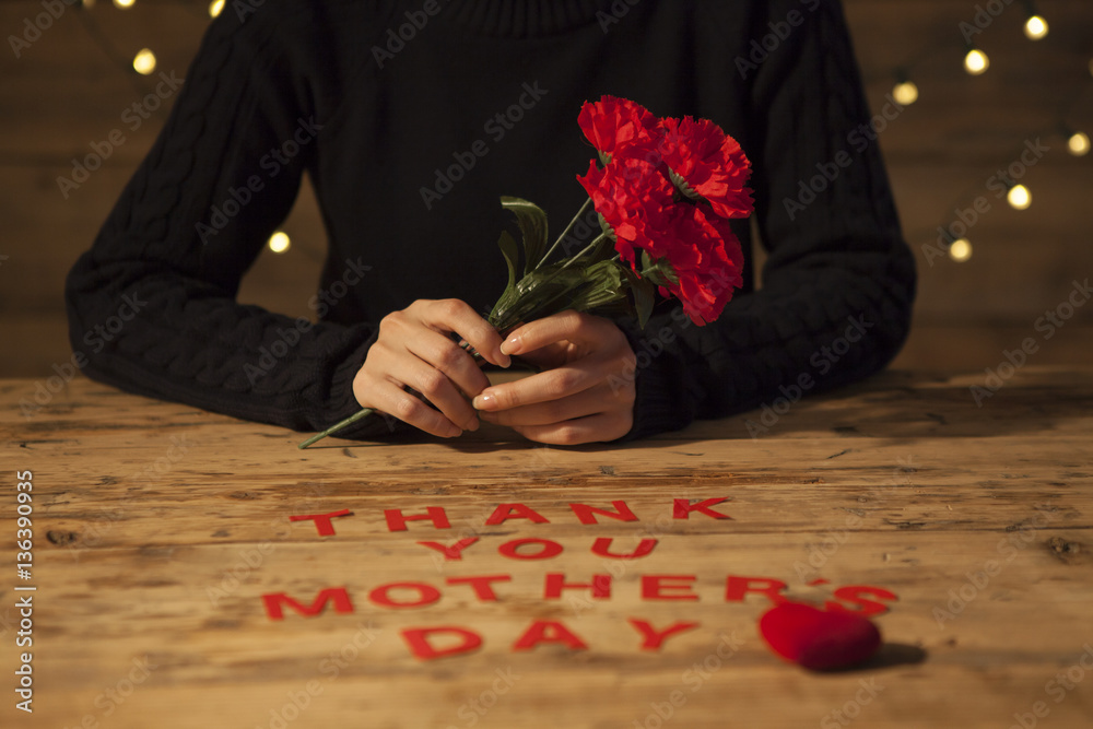 Women are receiving carnations on Mothers Day