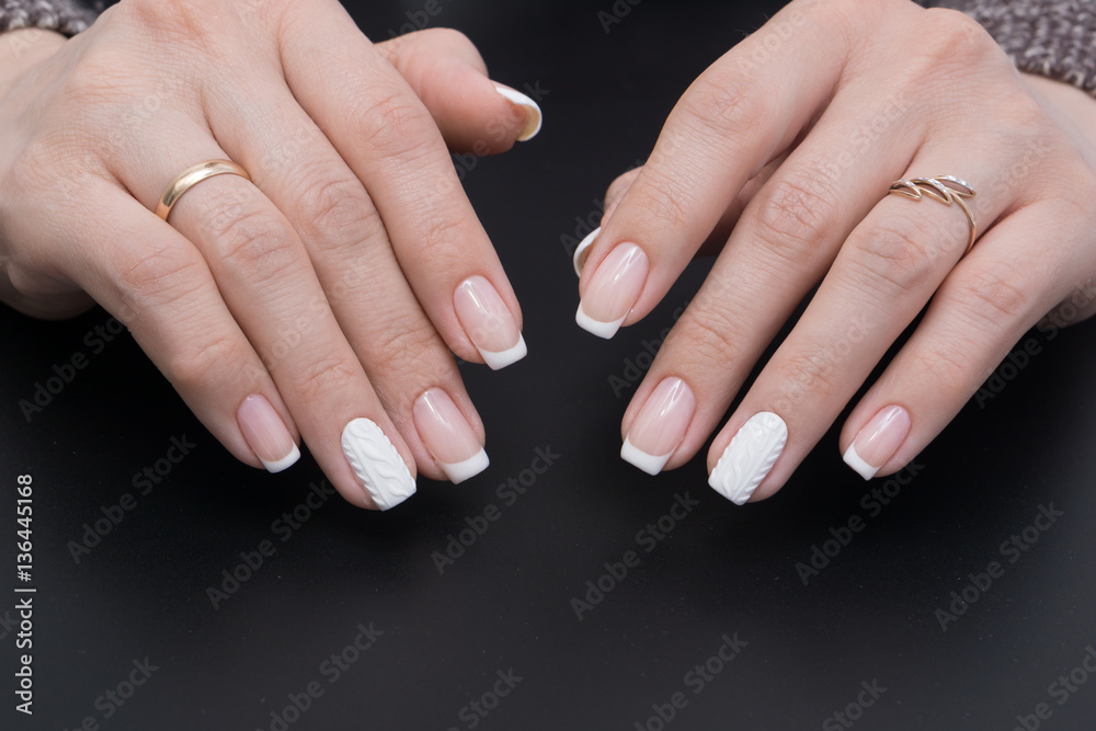 Beautiful hands and natural nails, ideal clean manicure. Decorated with stylish elements