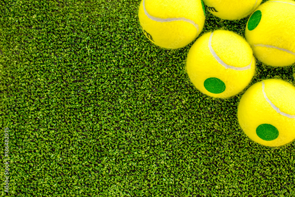 tennis ball on green background top view mock up