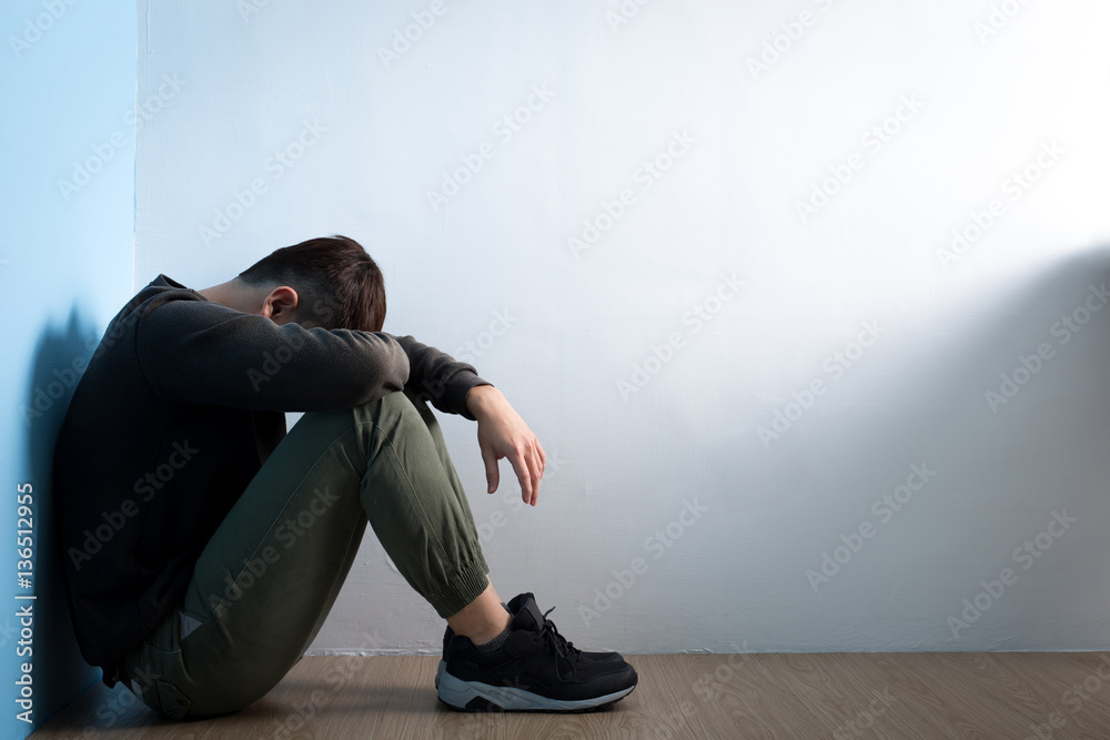 depression man sit on floor