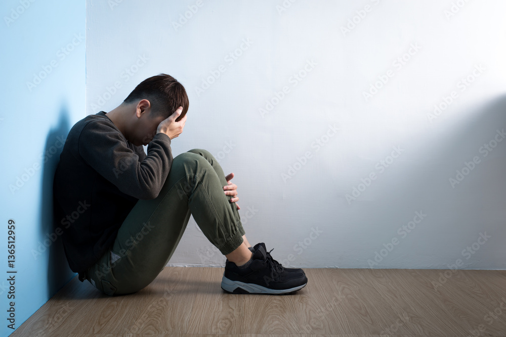 depression man sit on floor