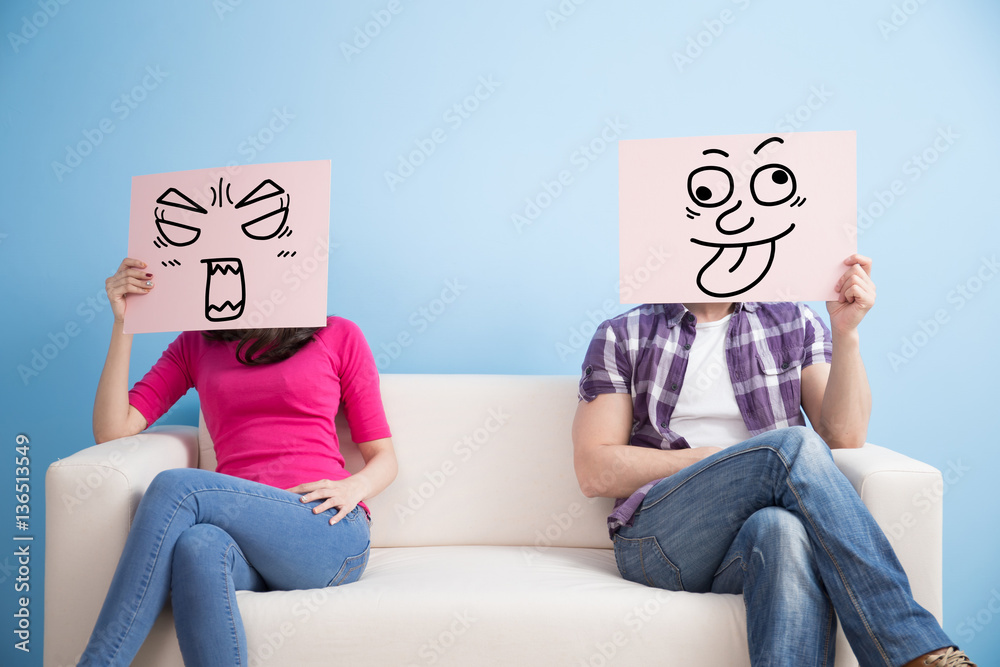 couple hold billboard