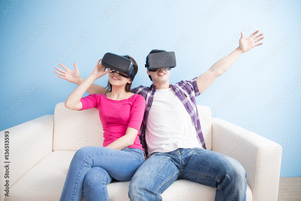 young couple play vr game