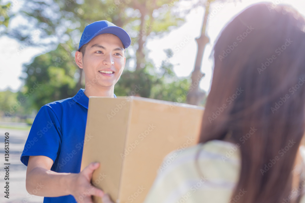 deliveryman stand and smile