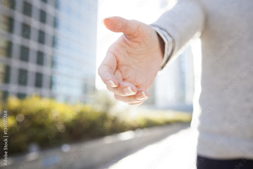 Business women are giving out hand