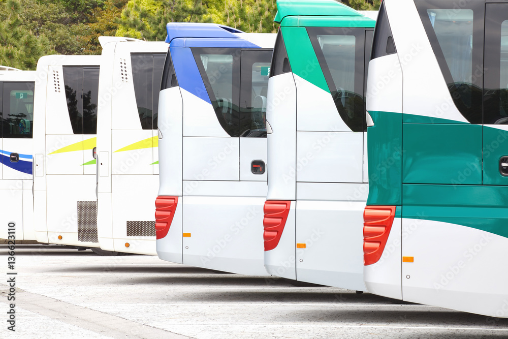 Row of Tourist bus coach parked at carpark