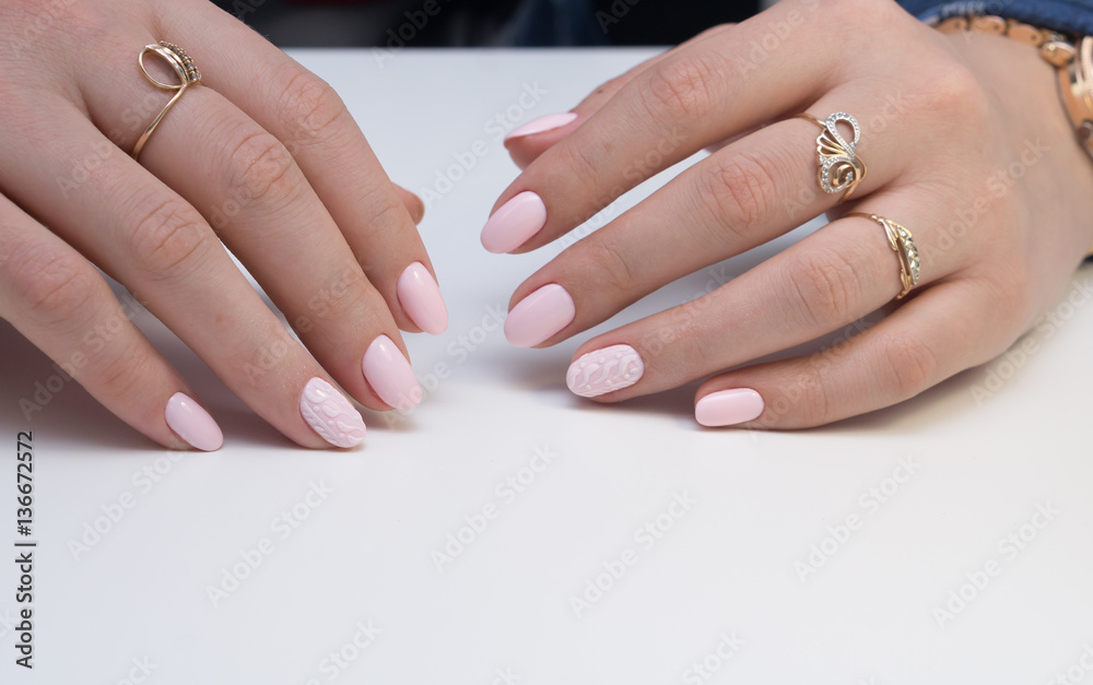 Hands and natural nails, ideal clean manicure. Decorated with stylish elements